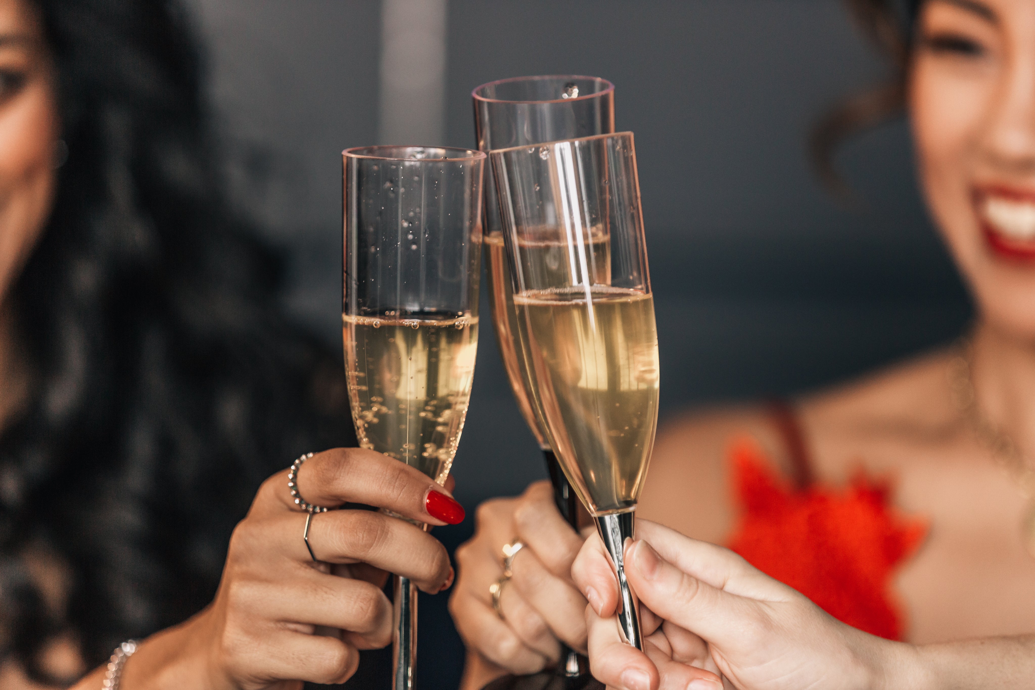 three-friends-toasting-with-champagne